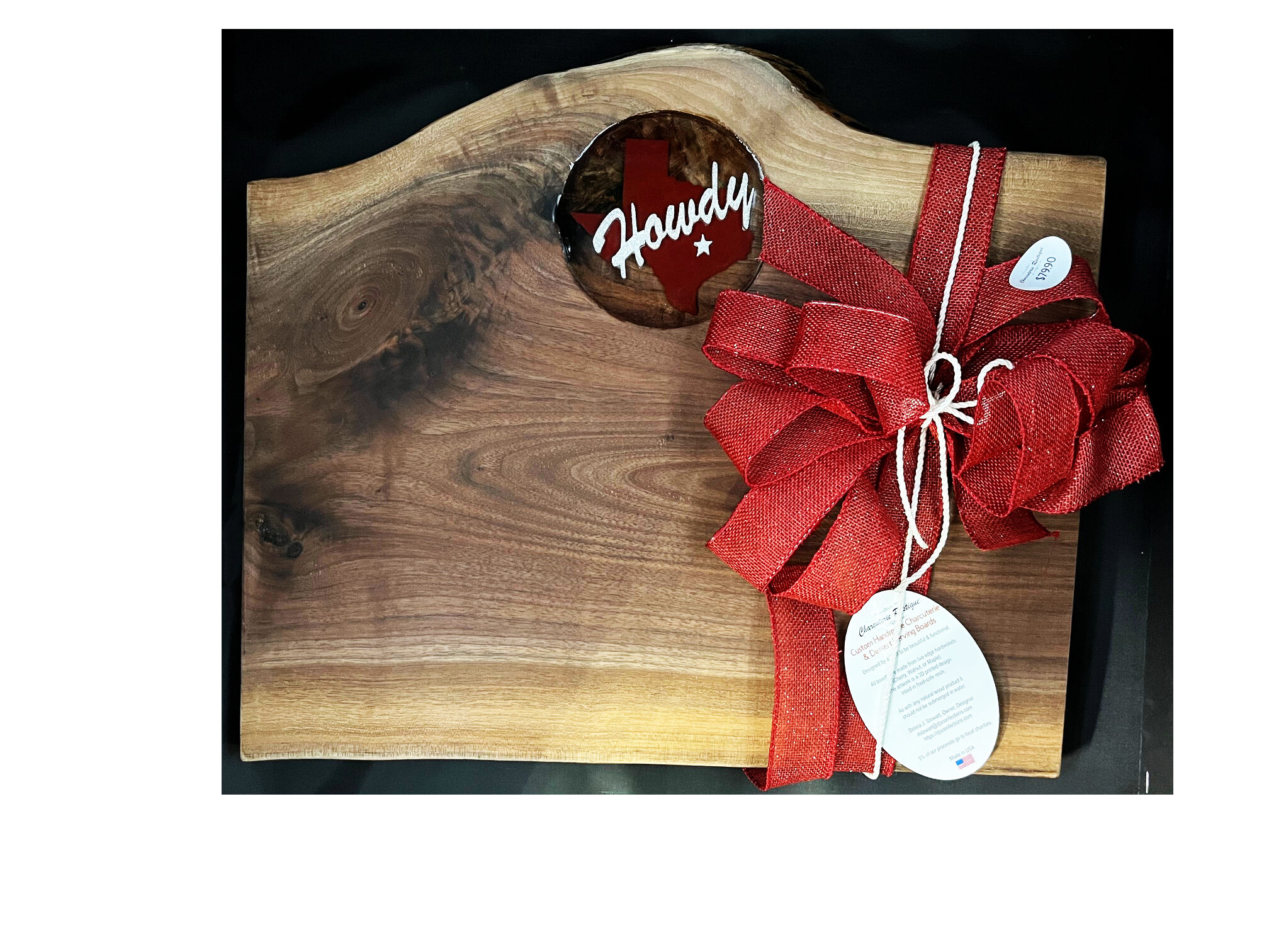 Walnut Serving/display board with Clear resin inset featuring Texas in Burgundy and Howdy in White Sparkle lettering. Walnut Serving/display board with Clear resin inset featuring Texas in Burgundy and Howdy in White Sparkle lettering.